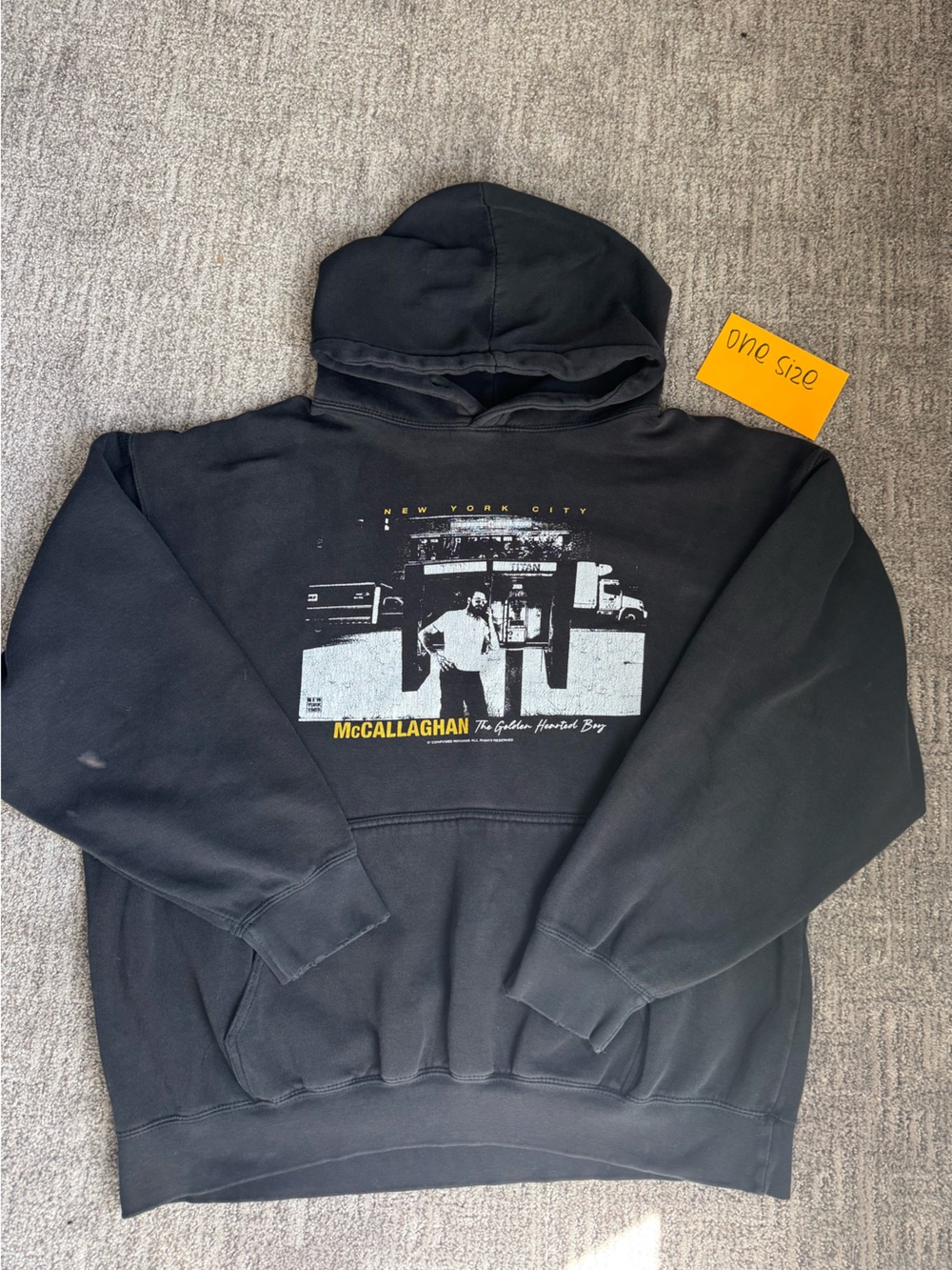 Brandy Melville Black Graphic Hoodie with Yellow Accent